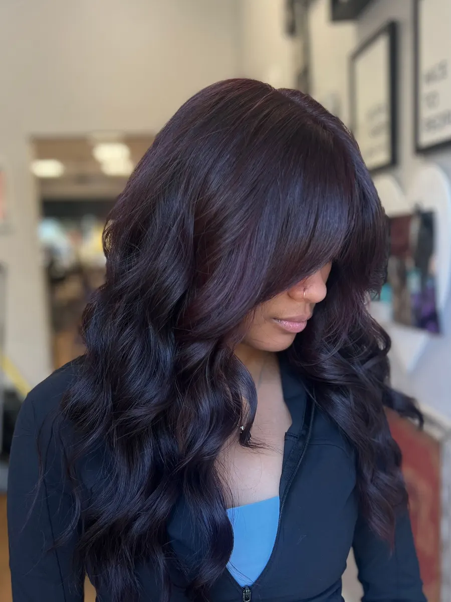 Deep violet waves with curtain bangs